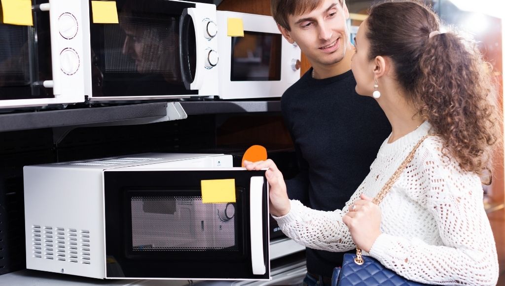 A couple has come to the market to buy their favorite smart oven